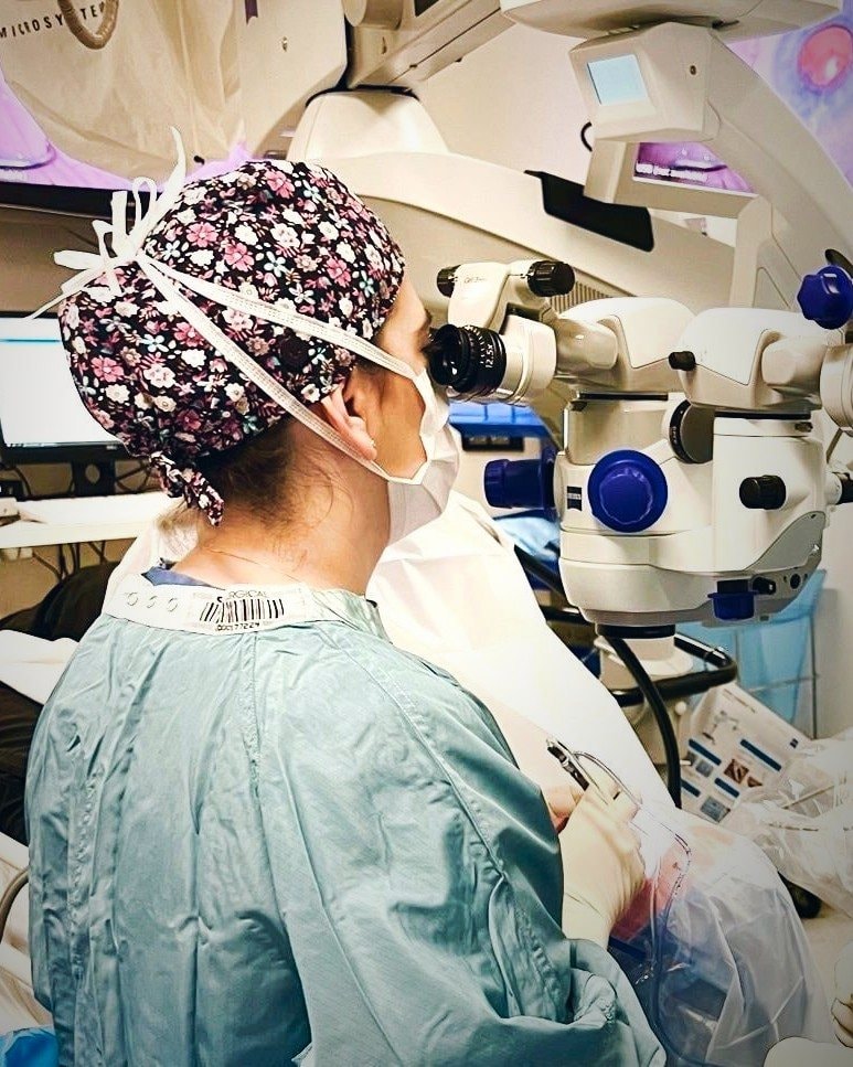 Dr. Tal Sharon operating at the surgical microscope